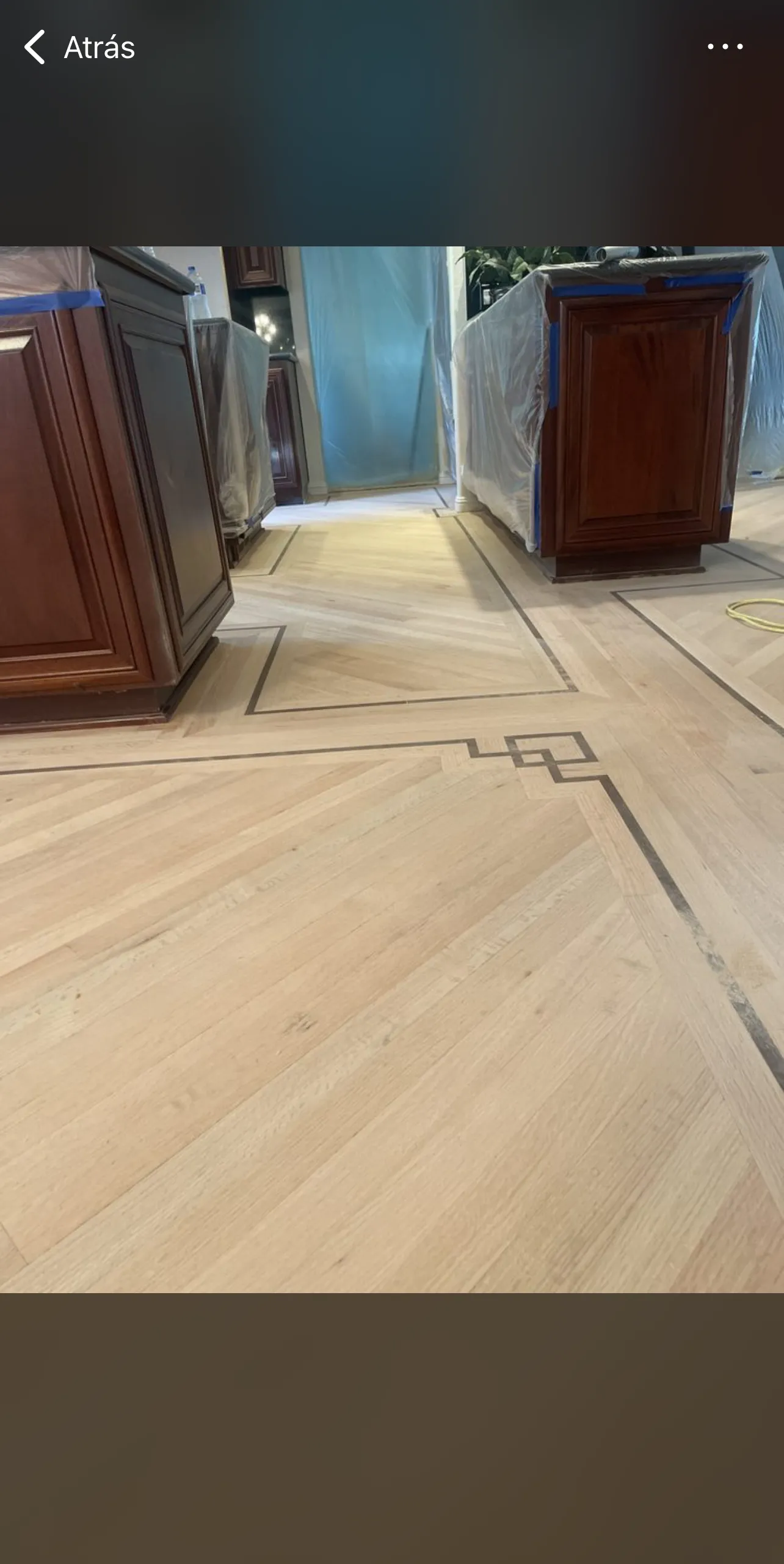 Custom hardwood floor with decorative inlay border